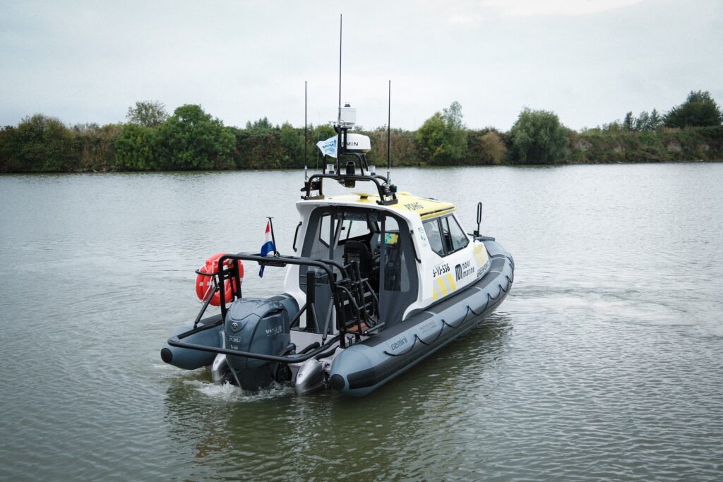 Stern view of the Gemini WR880 Hybrid Cabin RIB Greenpoint 2 on the water