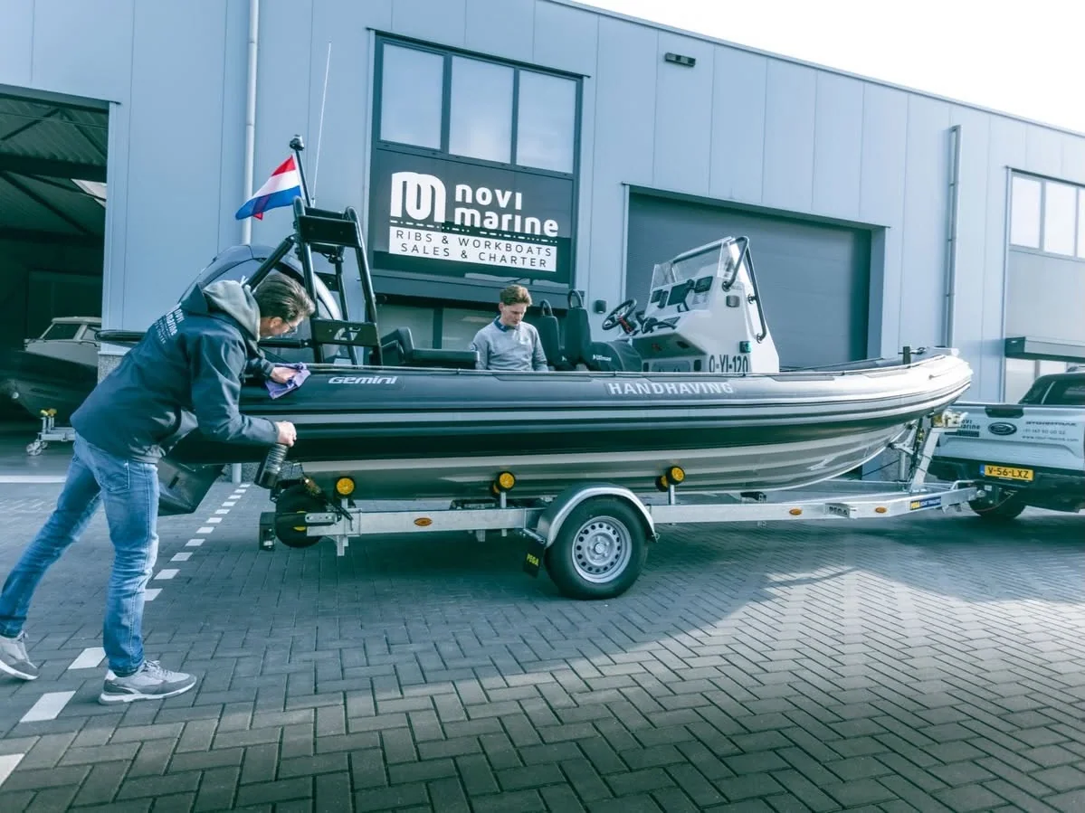Gemini RIB with Handhaving enforcement markings on a trailer at Novi Marine